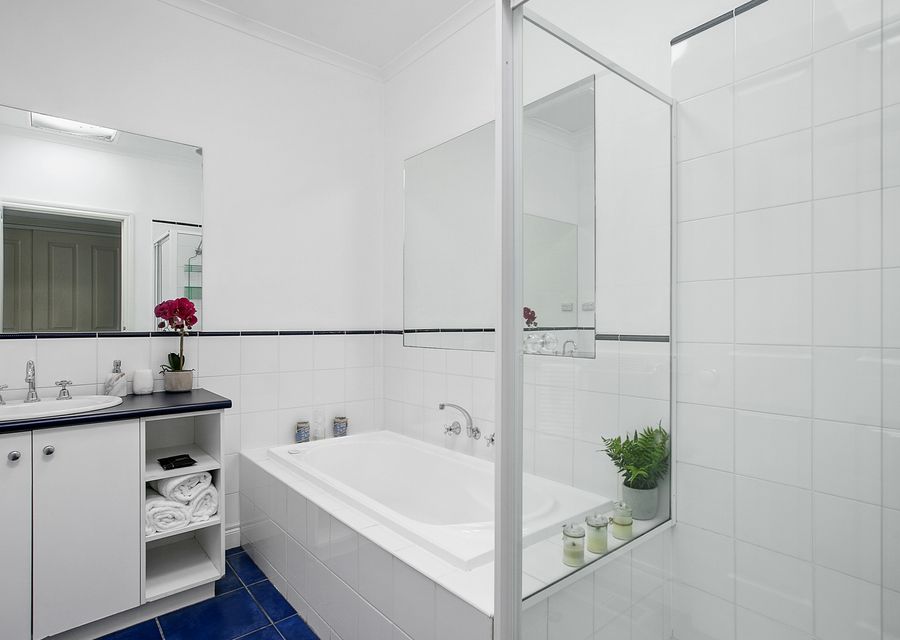 Main bathroom with bath and shower 