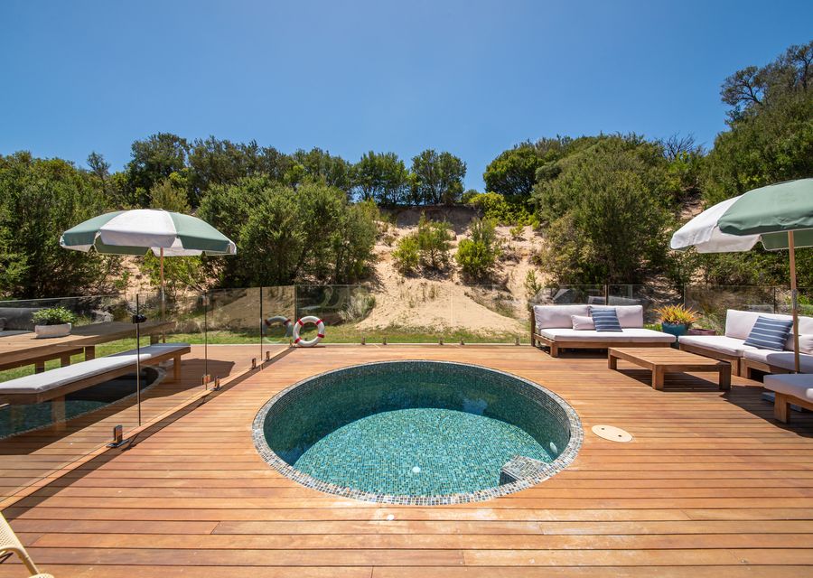 Gas heated mineral plunge pool over looking the sandune