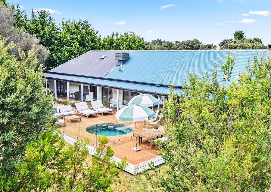 Sunlounges and plenty of pool side seating 