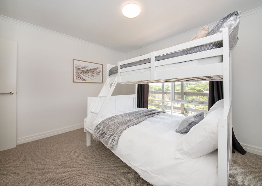 Bedroom 5 with double bunk and single above 