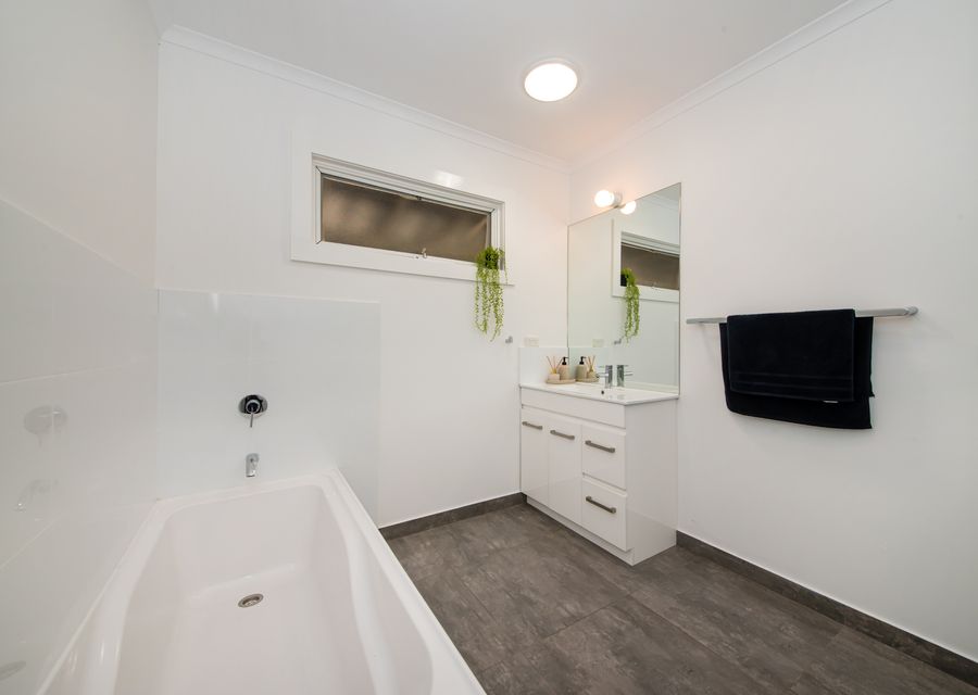 Bathroom with bath and shower 