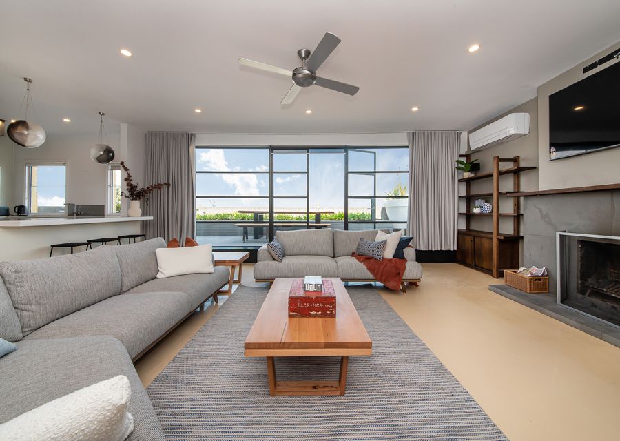 Open plan living opening to one of two rooftop balconies