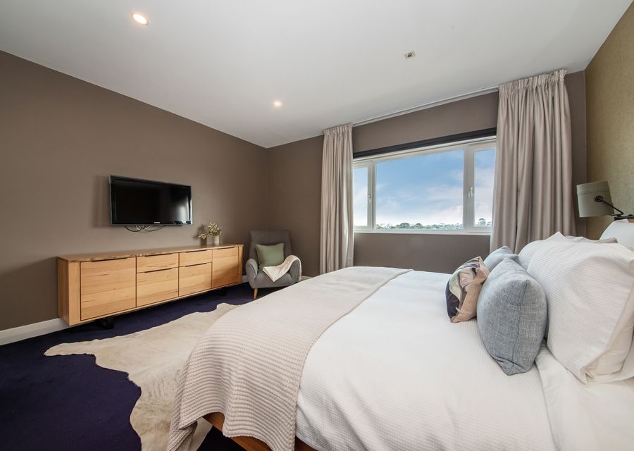 Beautiful master bedroom with king bed