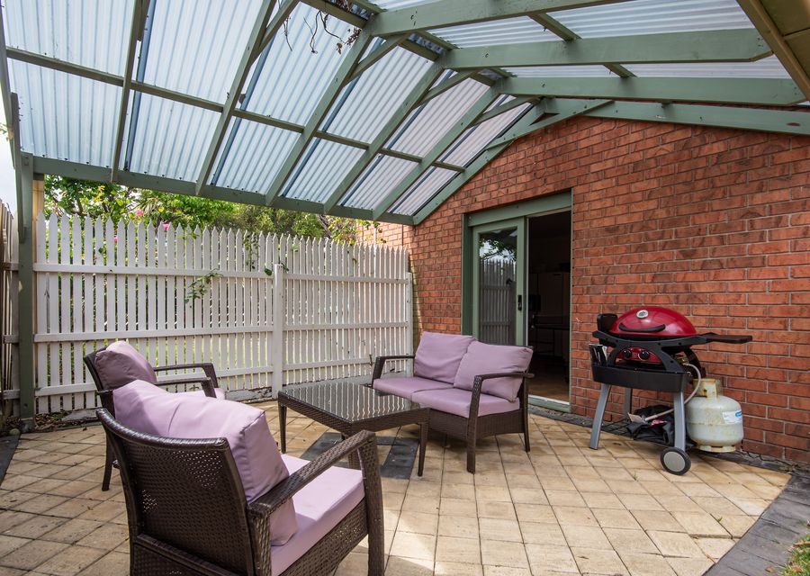 Backyard outdoor seating with BBQ