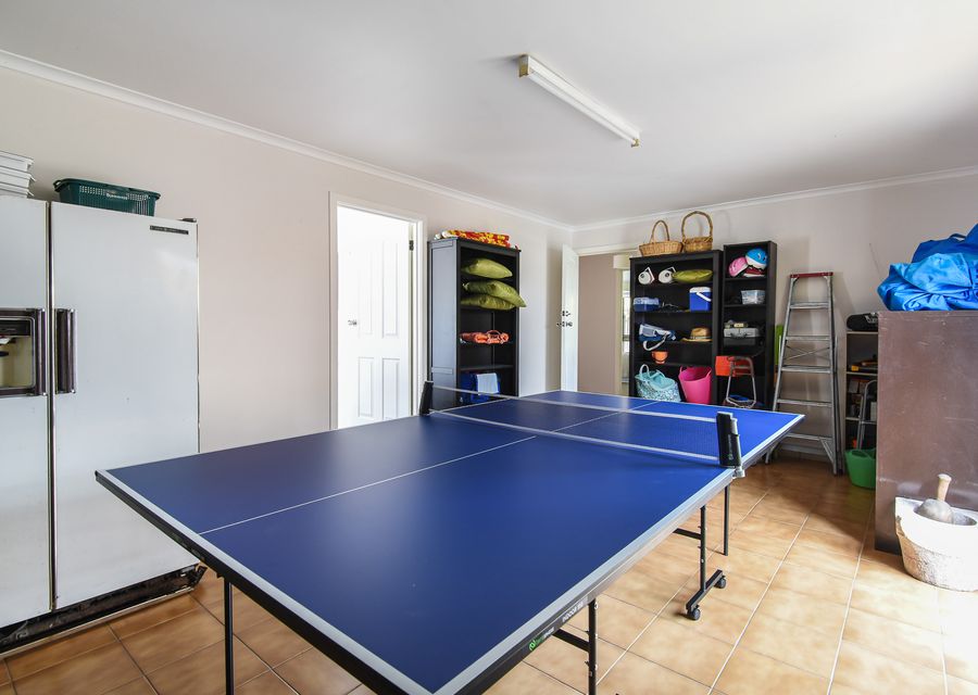 Games room with ping pong table 