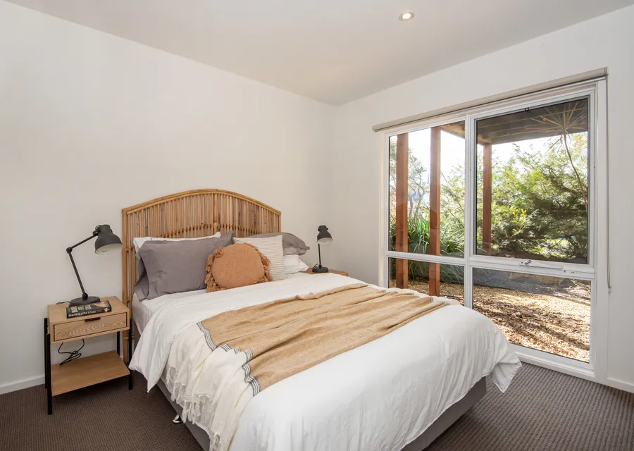 Downstairs bedroom 1 with queen bed