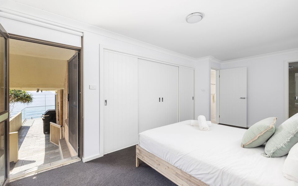 Main Bedroom upstairs, access to balcony