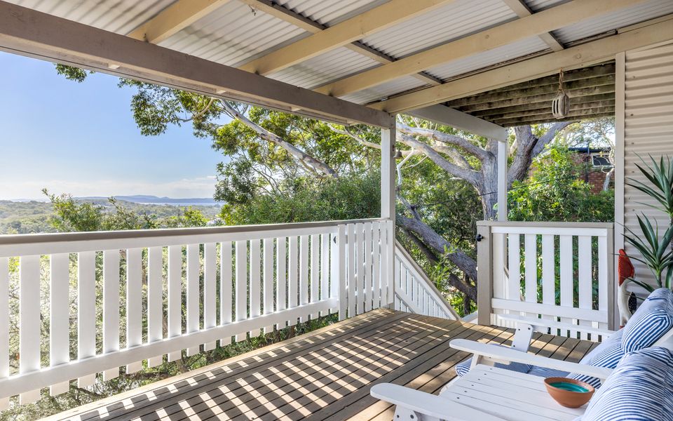 Balcony adjoining stairs from parking