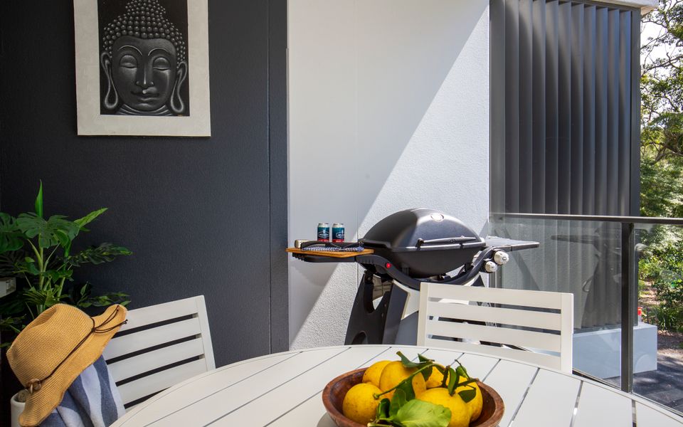 Latitude South Coast - huskisson accommodation balcony with barbeque and dining table