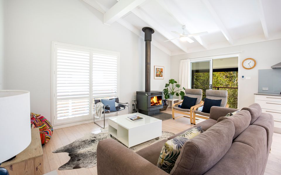 Latitude South Coast - jervis bay accommodation living room and fireplace