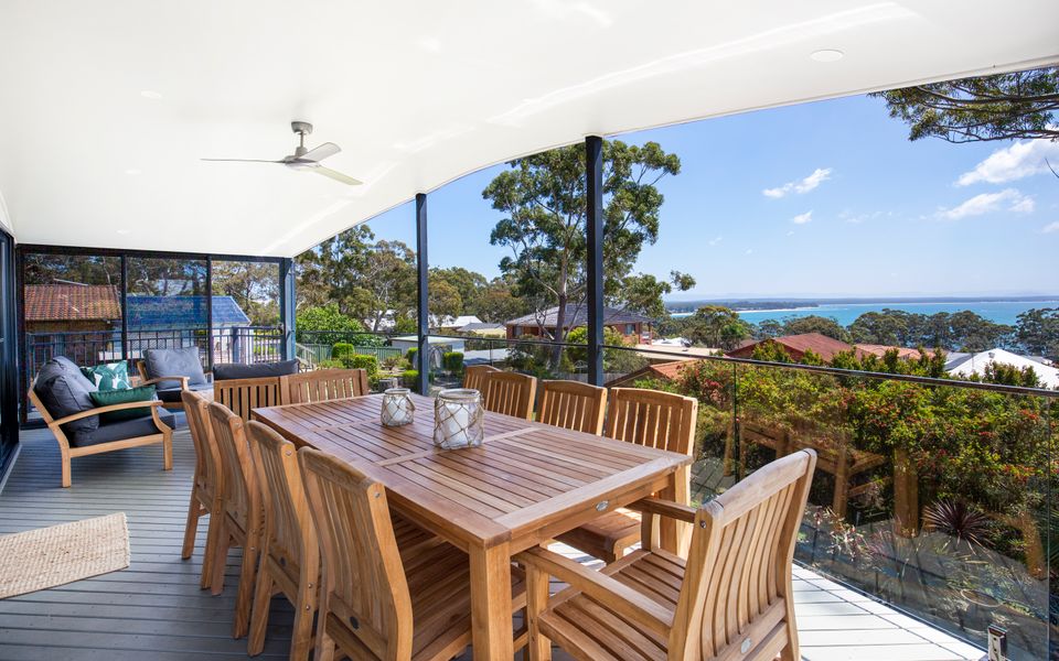 Latitude South Coast - vincentia holiday rentals balcony with dining set