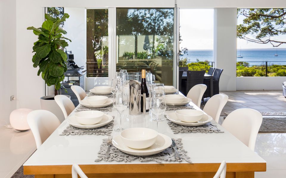 Latitude South Coast - beachfront accommodation dining table
