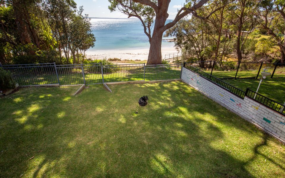 Latitude South Coast - vincentia pet friendly accommodation back courtyard with beachfront views