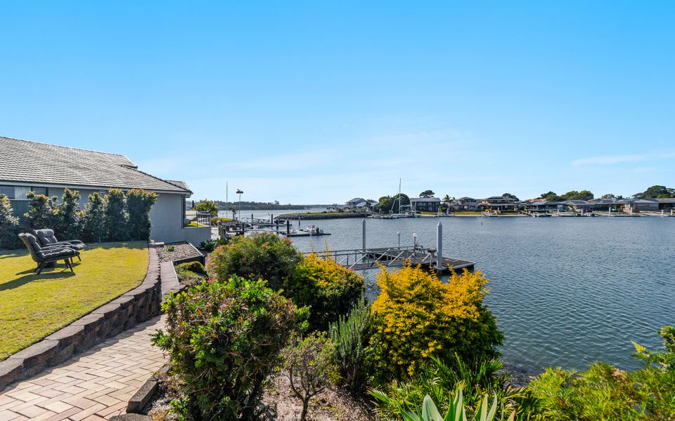 DOLPHIN WATERS | Waterfront Delight