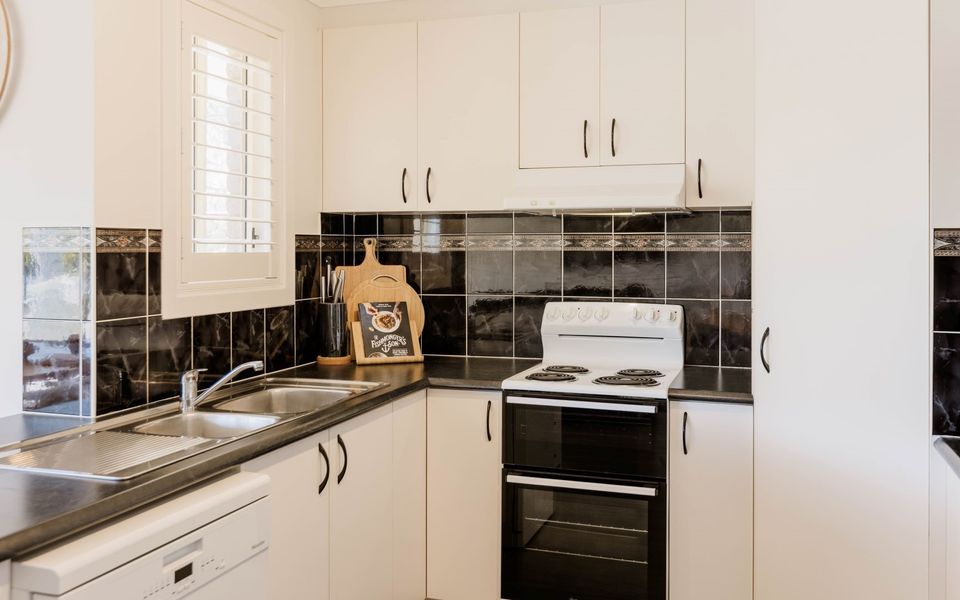 NABILLA COURT | Canal Front Duplex