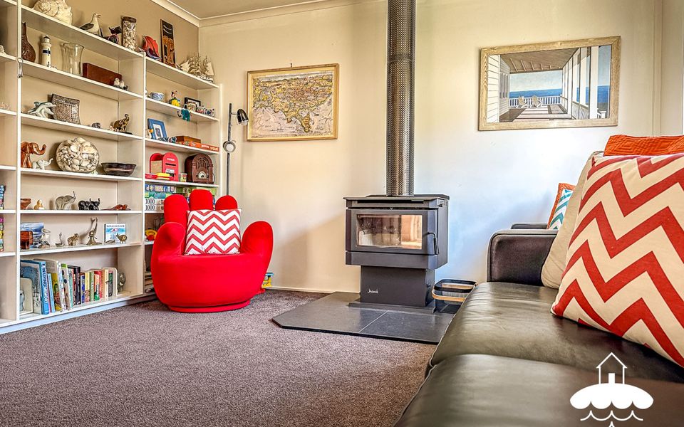 Lounge with wood heater upstairs