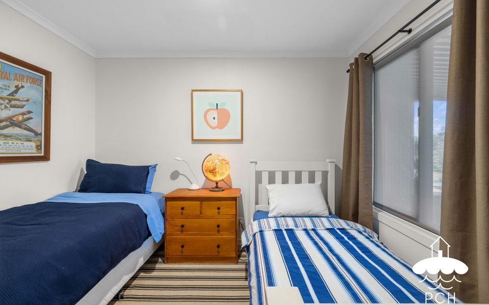 Bedroom Four with single beds downstairs