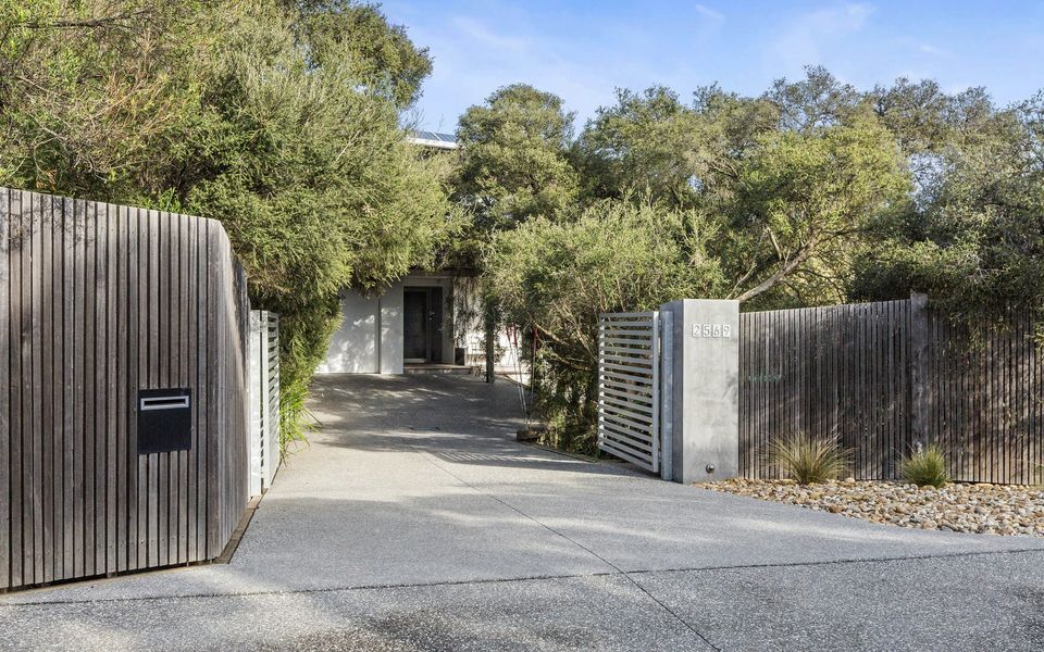 Entrance to property complete with secure remote controlled front gates.