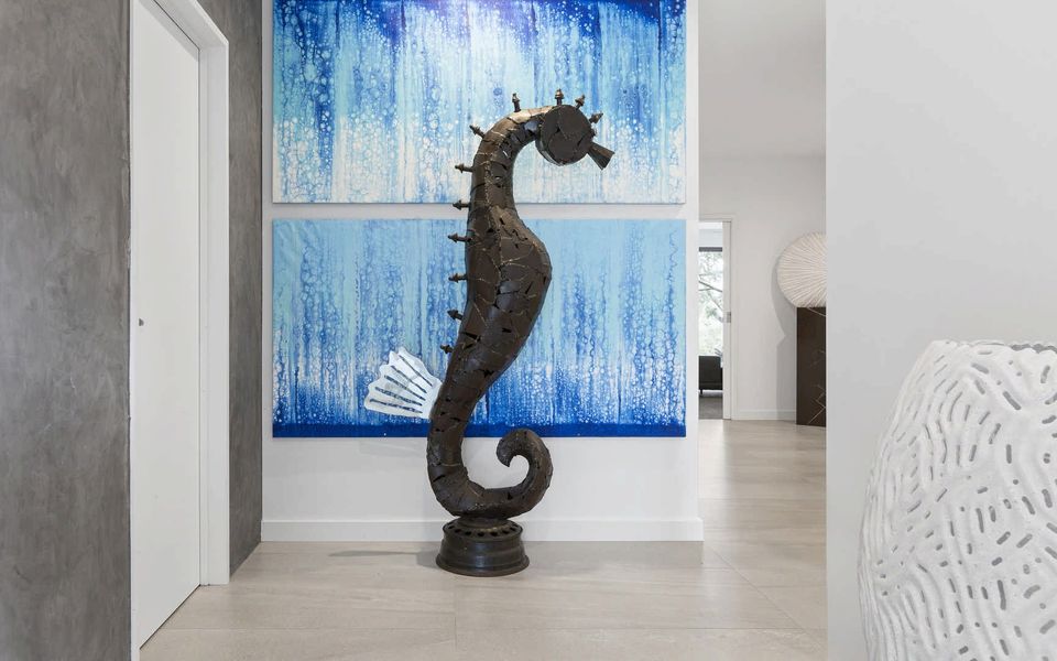 Ground floor entry with internal access to the garage on the left.