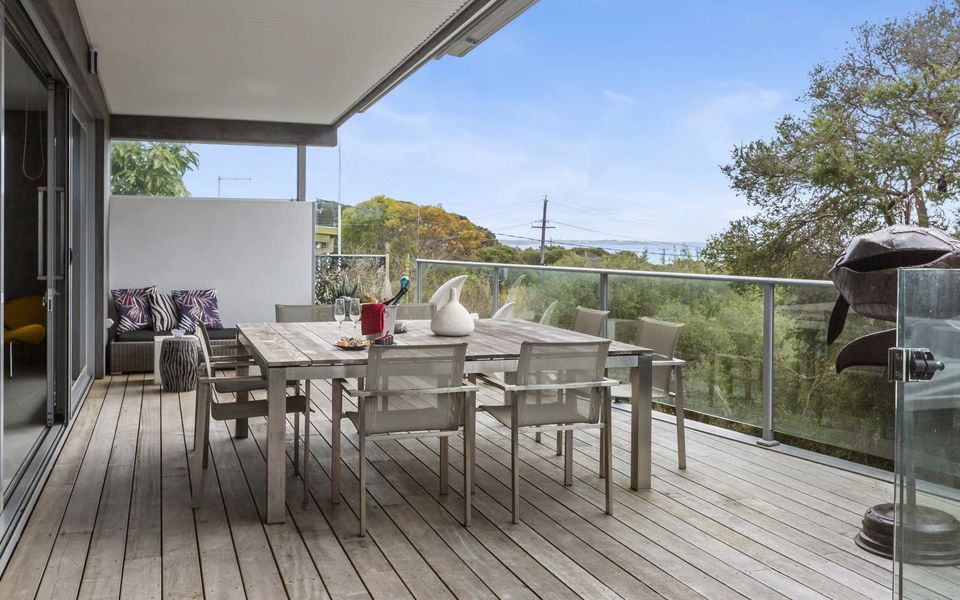 Outdoor entertaining area with heated spa, BBQ, TV and remote controlled outdoor awning.