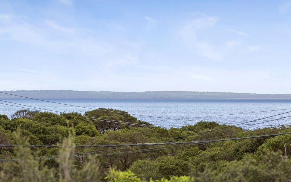 Beautiful bay view from the outdoor entertaining area and the open plan living area.