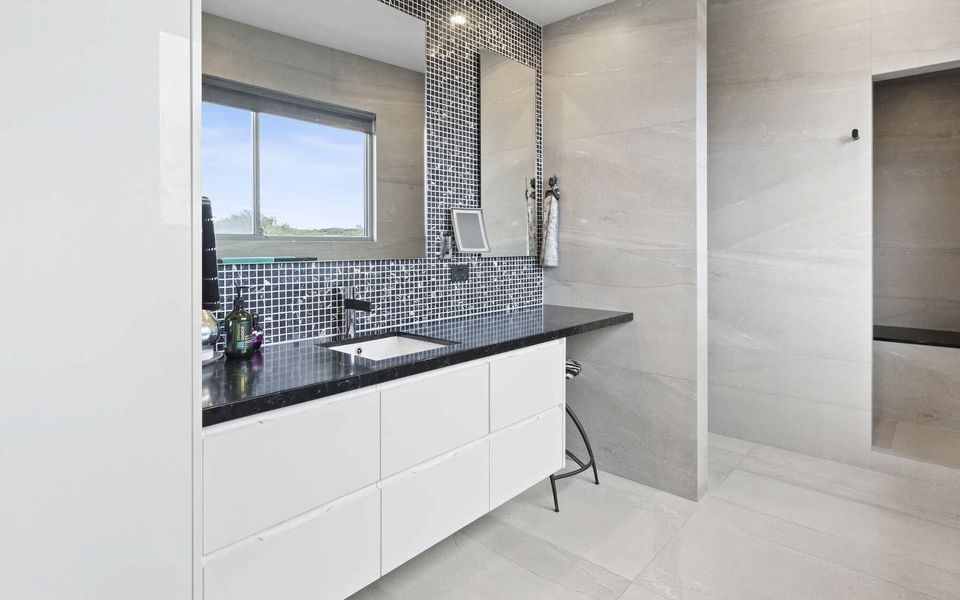 Master ensuite bathroom complete with Japanese toilet and steam room with shower.