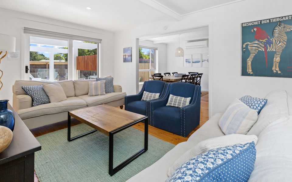 Open plan family room with sliding door access on to the decked outdoor area.