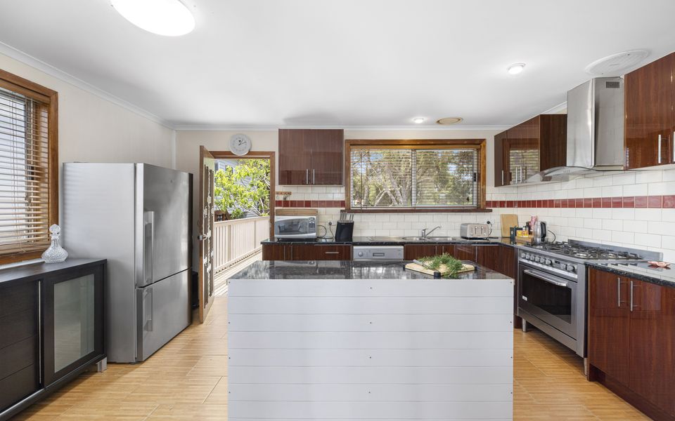 Large kitchen with stainless steel appliances