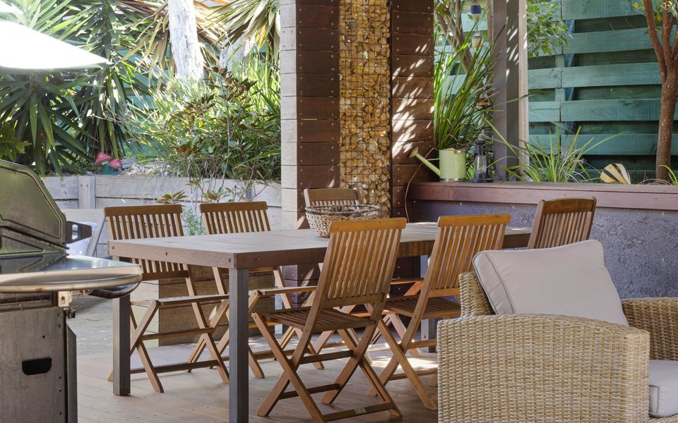 Alfresco area with outdoor table for six and BBQ