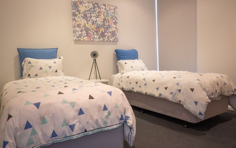 Two single beds that can be set up as a king if required