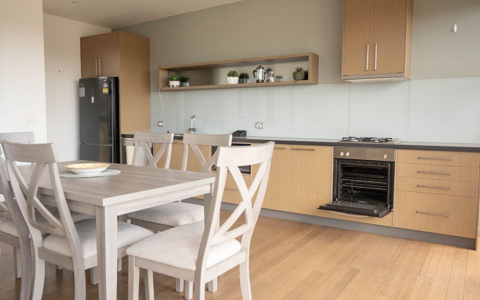 Well equipped kitchen with dining area that seats six.