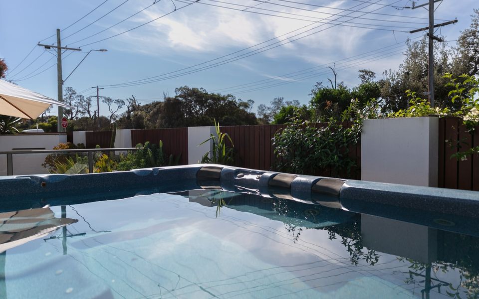 Heated Spa in front courtyard