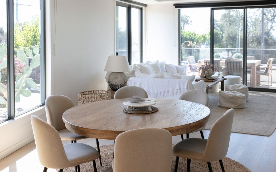 Open plan living dining area with access to the balcony.