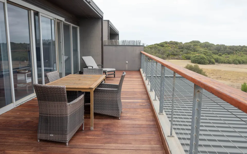 Outdoor deck with sun lounger, BBQ and outdoor table for four. Lovely views across the golf course.