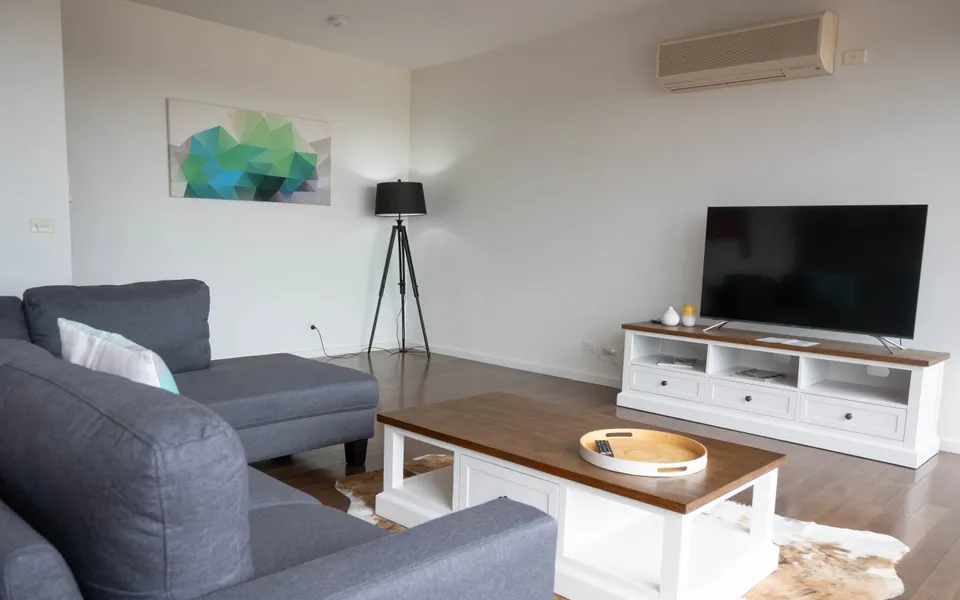 Smart TV in living area with air-conditioning