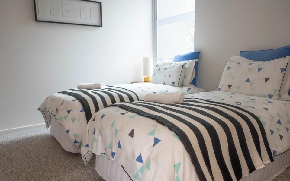 Bedroom 2 with two King Singles or a King bed, please specify your requirement when booking.