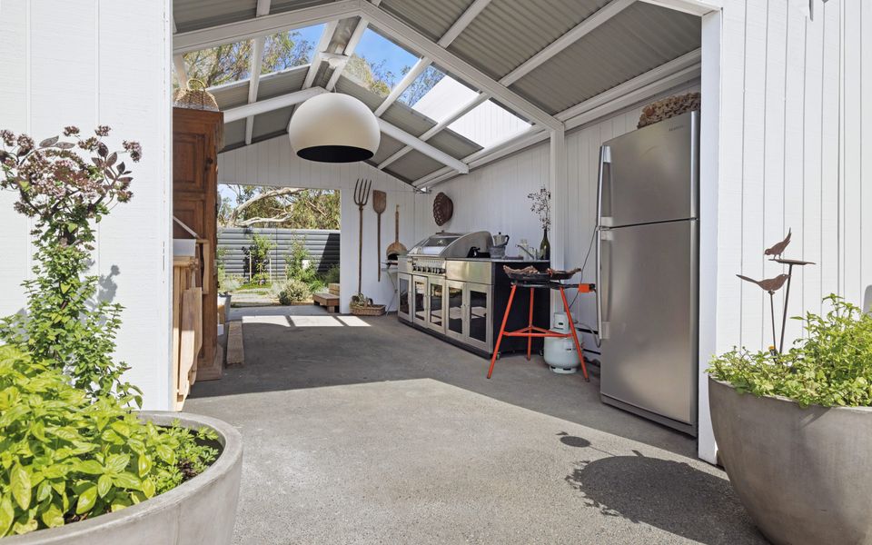 Large undercover BBQ area with Paella cooker, BBQ Rotisserie and Pizza Oven