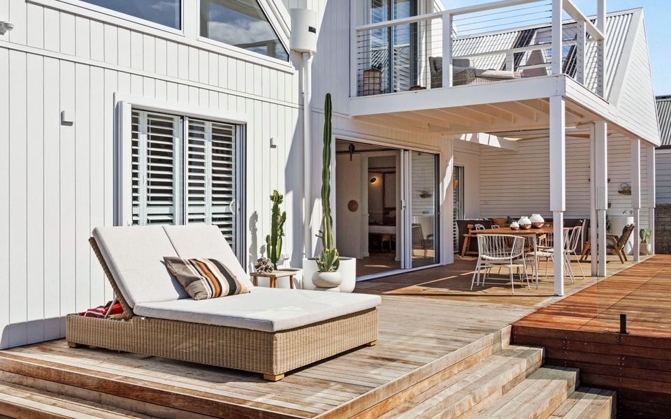 Outdoor entertaining area and upstairs retreat balcony