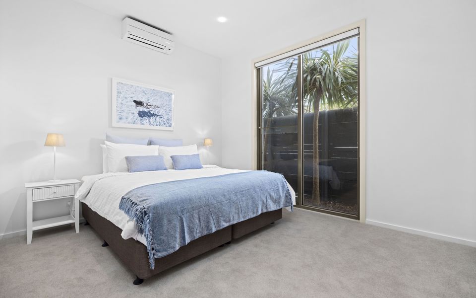 Bedroom 3 with King bed that can be split into two King singles