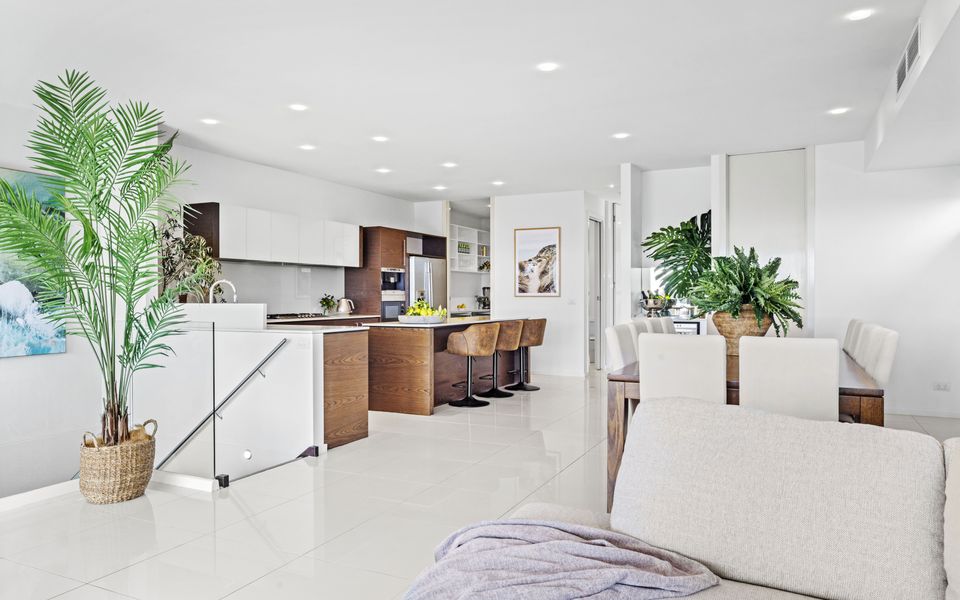 Open plan living dining area with heating and airconditioning.