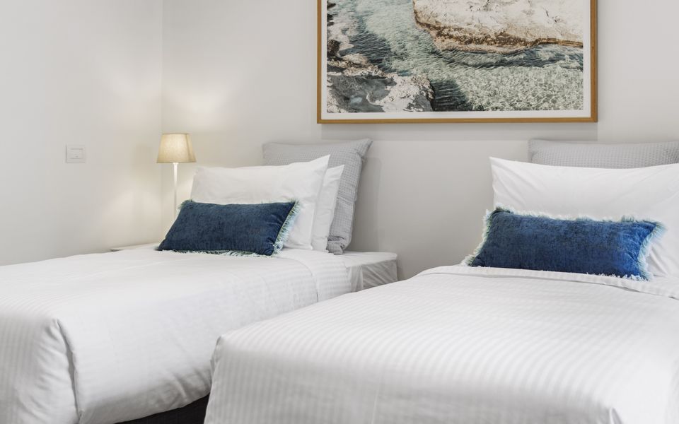 Bedroom 4 with two King singles that can be joined to make a King Bed