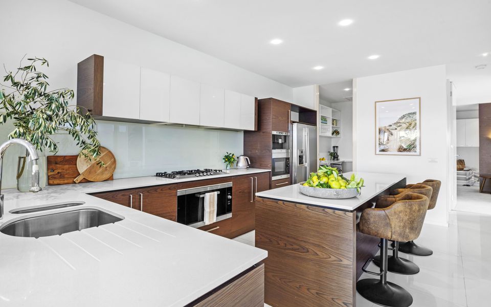 Modern sleek kitchen with large butlers pantry
