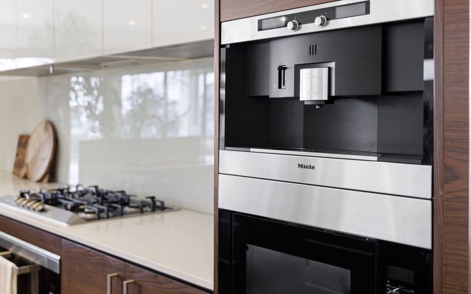 Miele kitchen appliances including a coffee machine