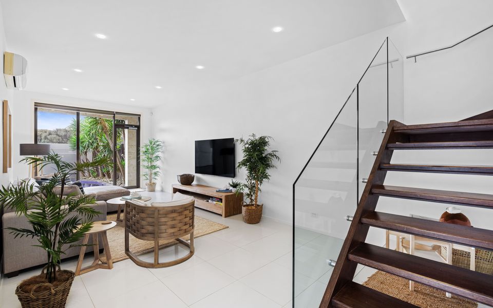 Ground floor living room with children's nook and smart Tv