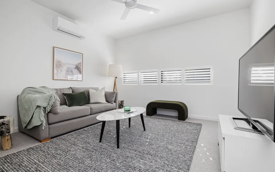 Living room with TV, near the master bedroom
