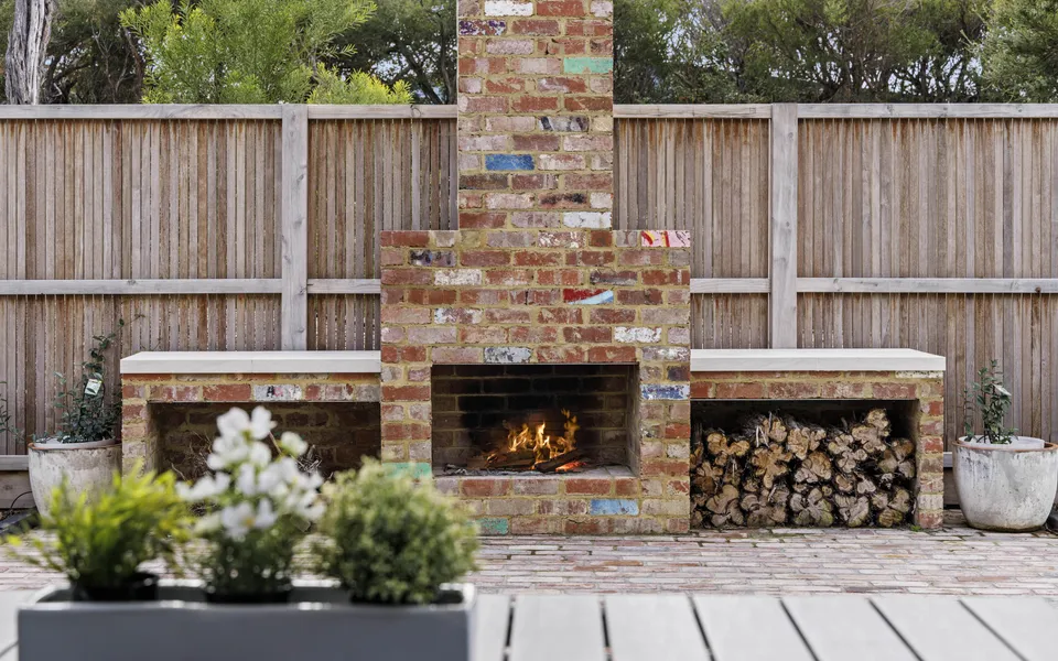 Settle in around the outdoor fireplace for a cosy evening with the family, think toasted marshmallows