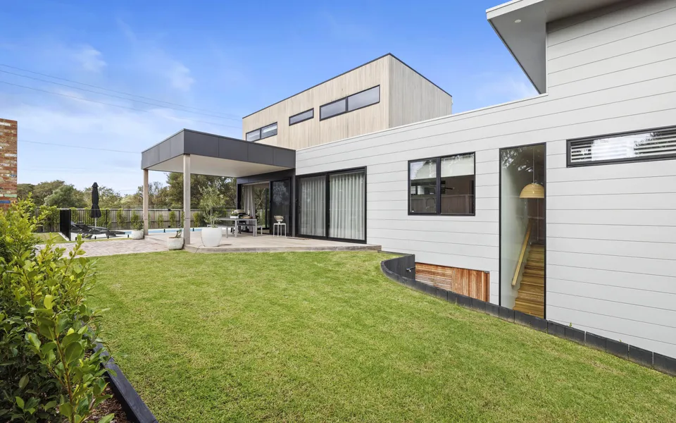 Beautifully maintained front garden and lawn