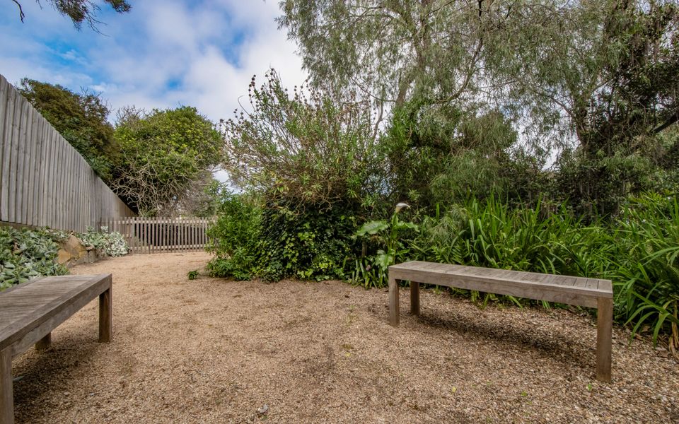 Bench seating for a quiet moment to pause and take in the sounds of nature