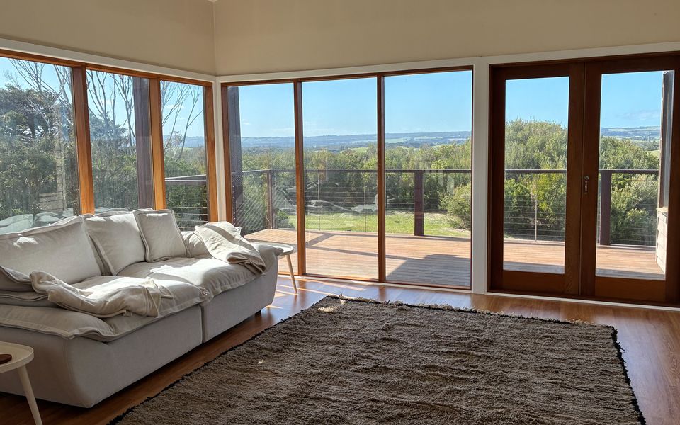 Living area with large undercover balcony and stunning views across St Andrews Golf Course