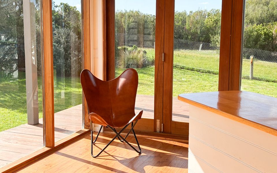 Direct access to the sheltered outdoor area, perfect for unwinding after a day of exploring.